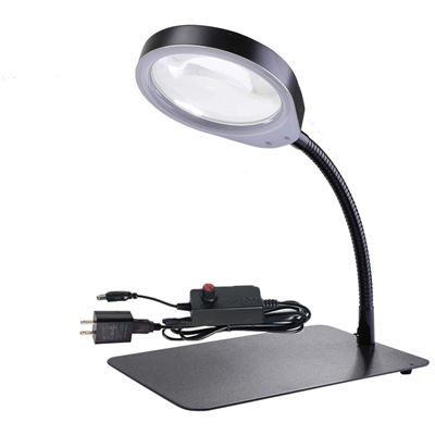 Suurendusklaasiga lamp